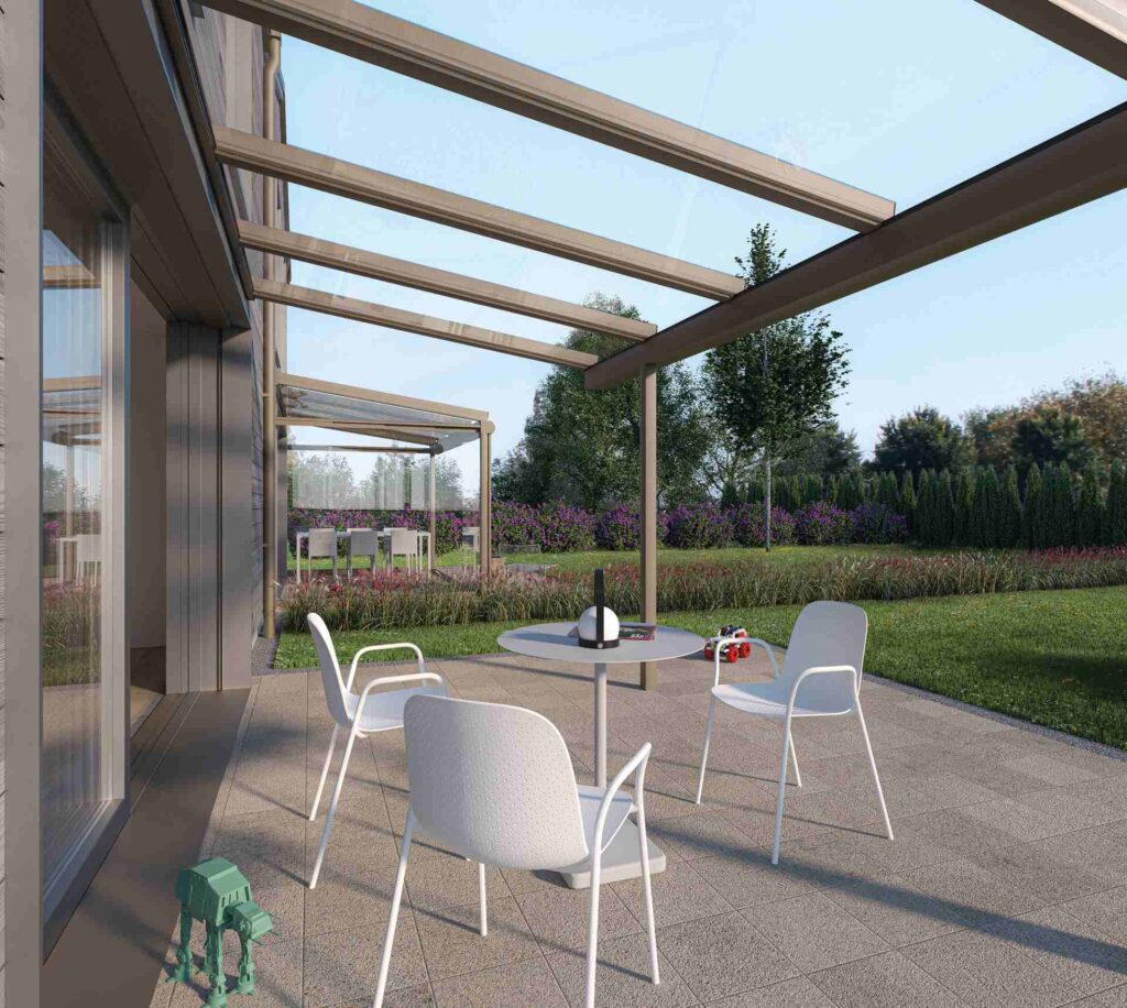 Terrasse mit moderner Aluminium Pergola und Sitzgruppe im Garten