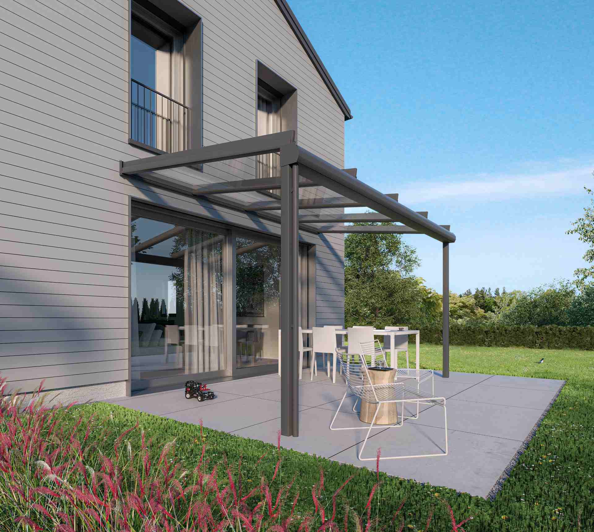 Terrasse mit Aluminiumüberdachung und Glasdach am Einfamilienhaus