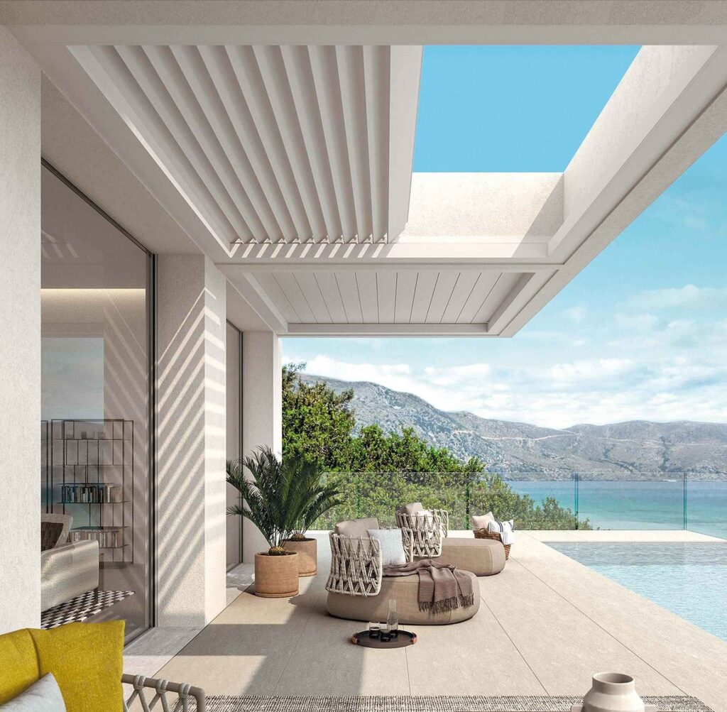 Moderne Terrassenüberdachung mit Lamellendach und Meerblick