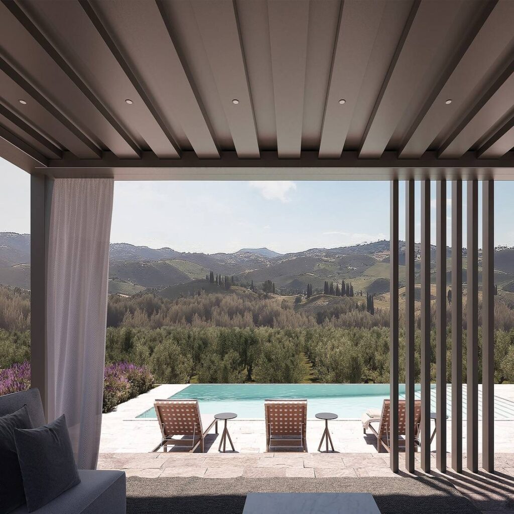 Pergola mit Lamellendach und seitlichen Designelementen mit Blick auf Pool und Landschaft