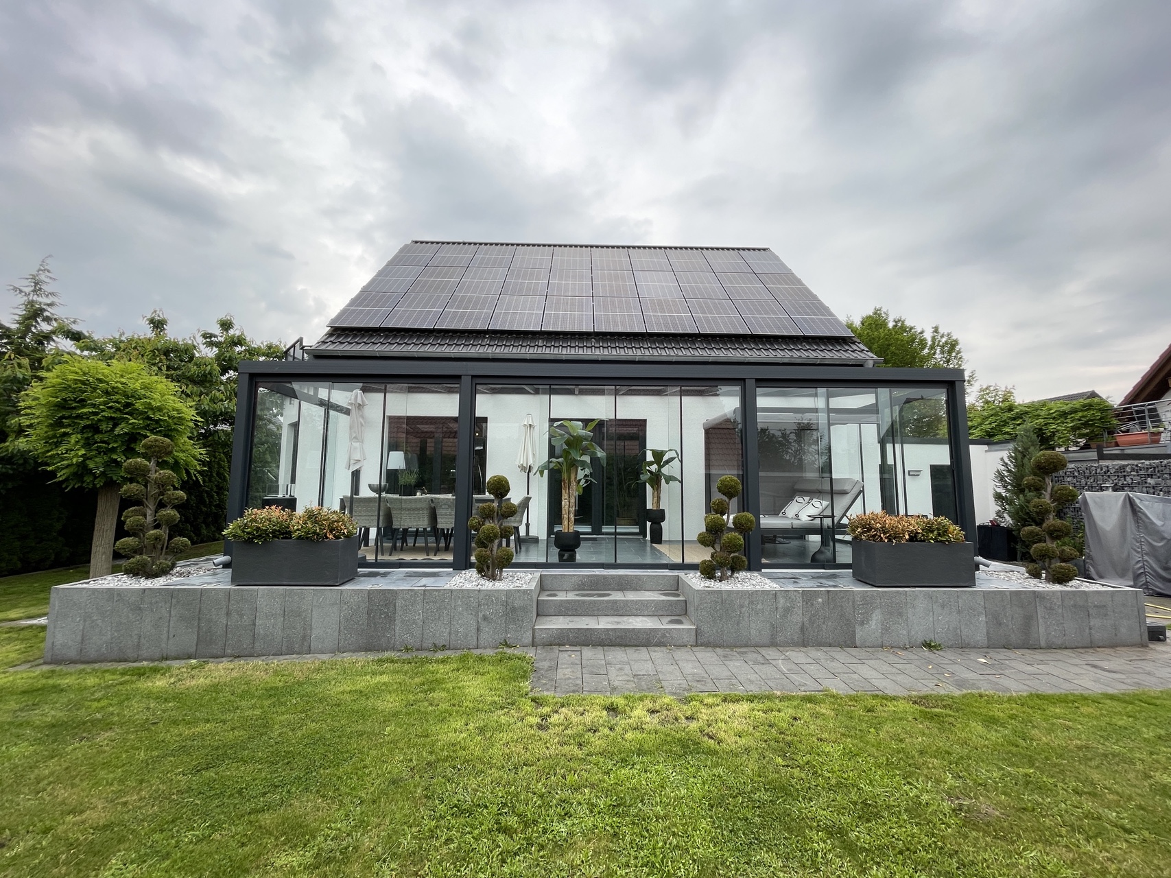 Terrassenüberdachung mit Glasschiebeanlage und Aluminiumrahmen